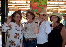 Dolly Ivey, Theresa Bealle, Joanne Quares and Gail Beuile show off their accessories.