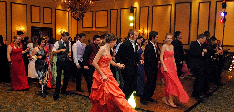 Students at the Braden River High School prom dance to the cupid shuffle.
