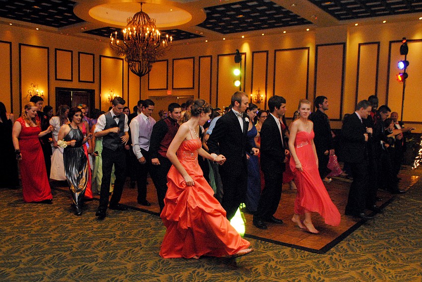 Students at the Braden River High School prom dance to the cupid shuffle.