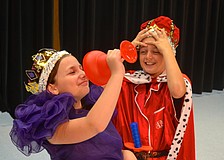 Arianna Pryor as "Queen Gertrude" and Gage Hinds as "King Claudius."