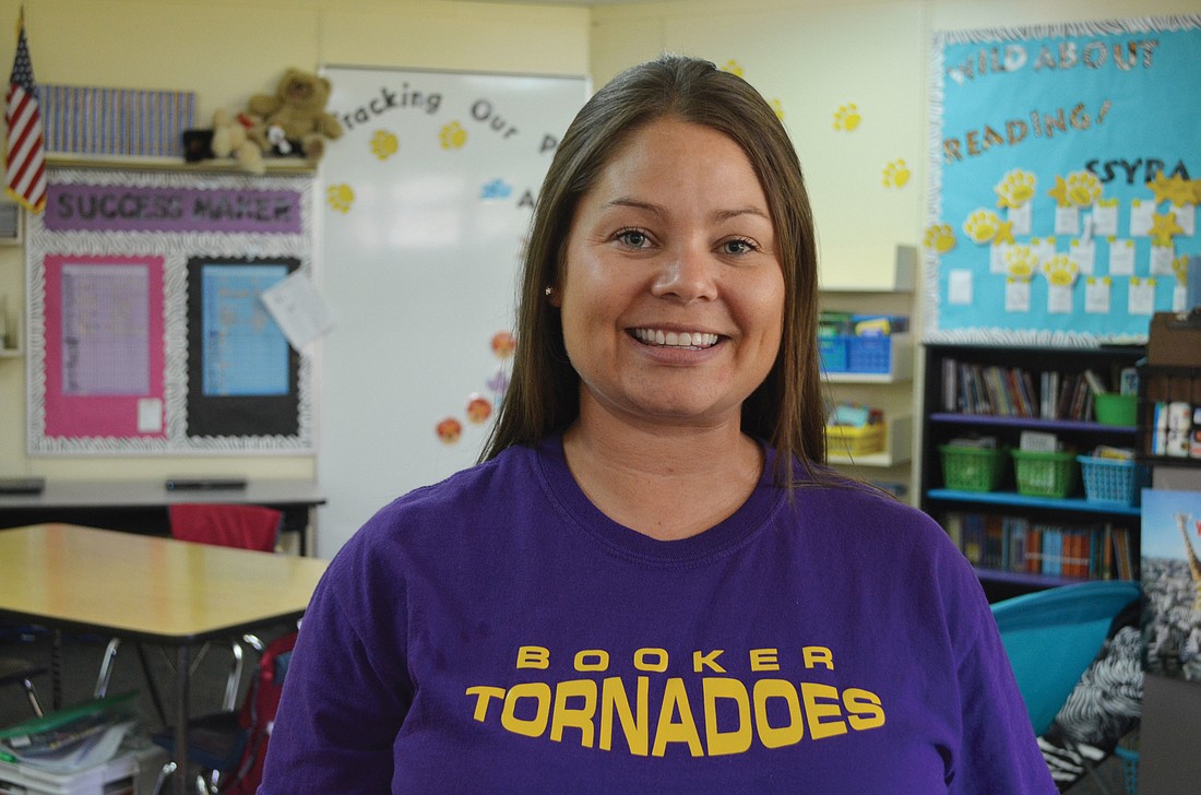 Dedra Reed is a fifth-grade teacher at Emma E. Booker Elementary. She says she enjoys the opportunity to help her students develop character.