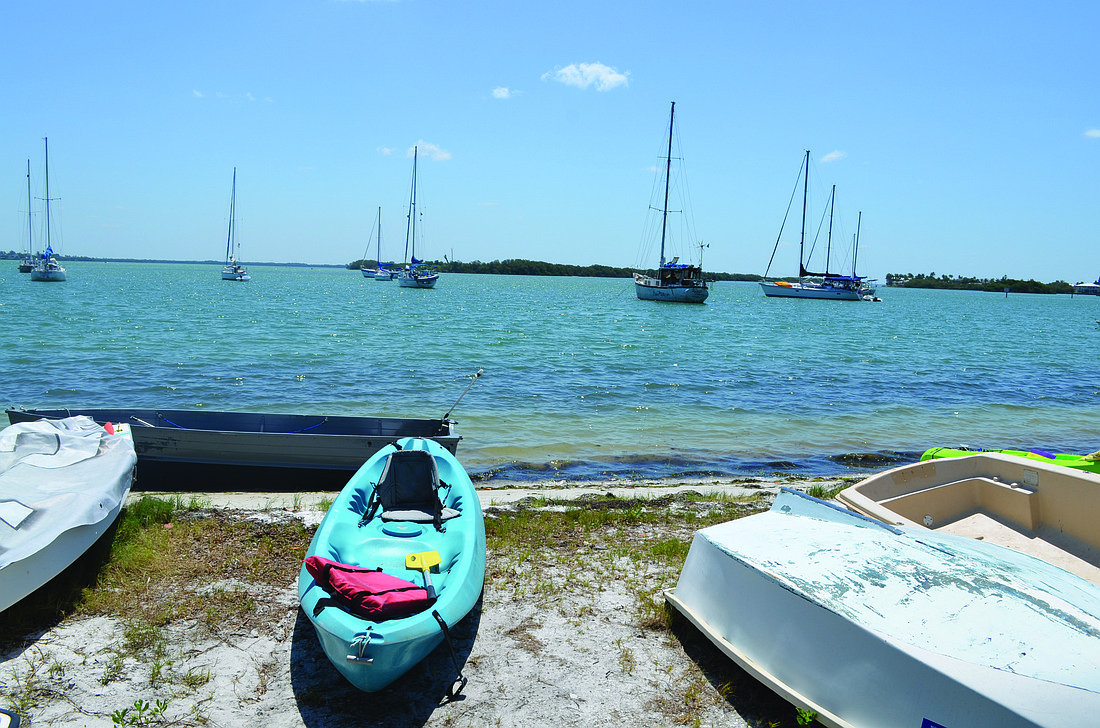 The town dock is a popular spot for launching kayaks in the Longbeach Village. Photo by Kurt Schultheis