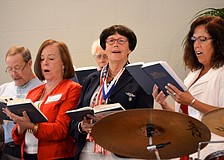 The Longboat Island Chapel choir sings along to â€œBattle Hymn of the Republic.â€