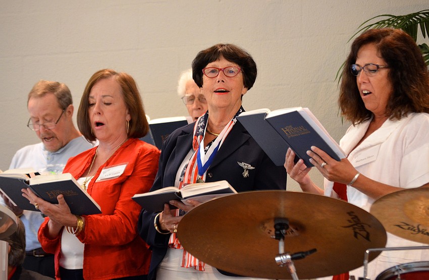 The Longboat Island Chapel choir sings along to â€œBattle Hymn of the Republic.â€
