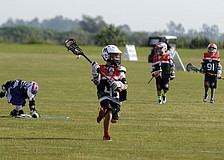 Nine-year-old Isaiah Cohen races down the field toward the goal for the Monsters U9 team.