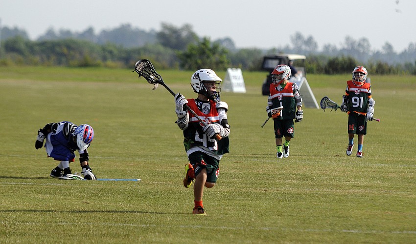 Nine-year-old Isaiah Cohen races down the field toward the goal for the Monsters U9 team.