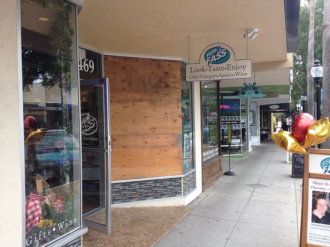 A fight between a business owner and a homeless man ended with a smashed window on the Vom Fass storefront.