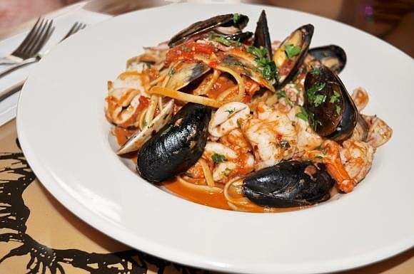 Linguine fra diavolo, which means "brother devil" in Italian, refers to a spicy tomato sauce.