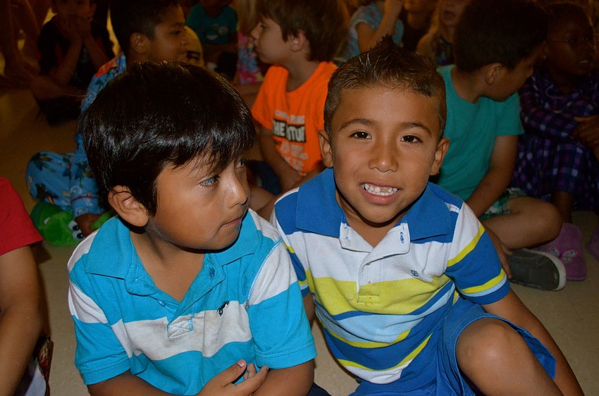 Antonio Jacobo and Oswaldo Rodriguez wait for the talent show to start.