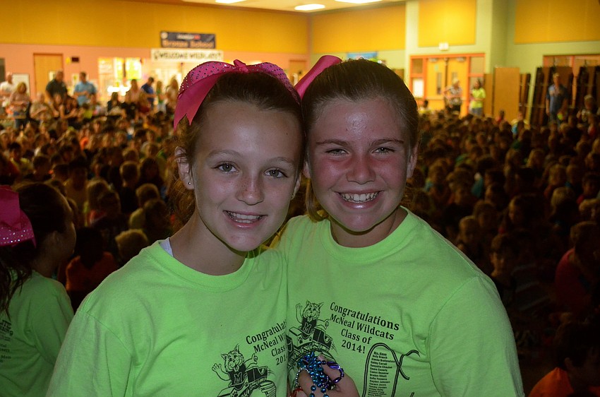 Sofia Jamieson and Brooke Rypel wait for their dance routine.