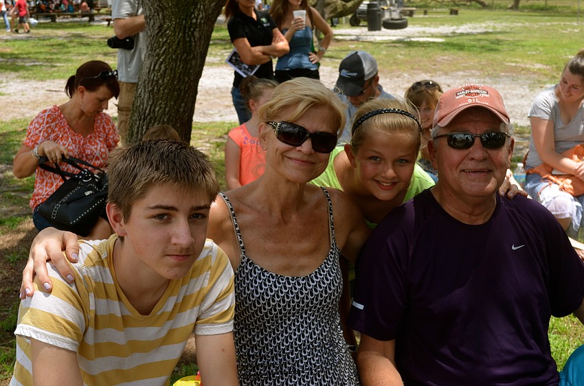 Cameron, Christy and Caleigh O'Malley, with Steve Langston.