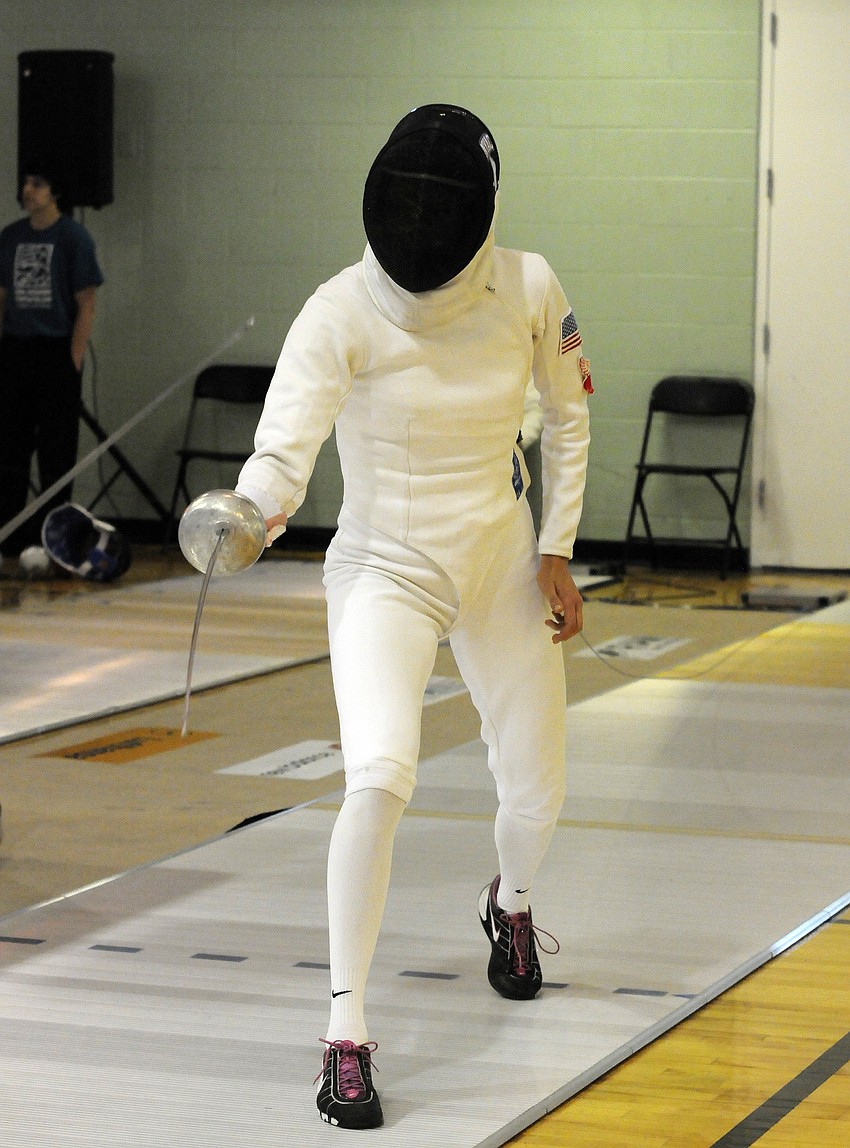 Margaux Isaksen competed in the mixed relay round robin fencing event for the United States.
