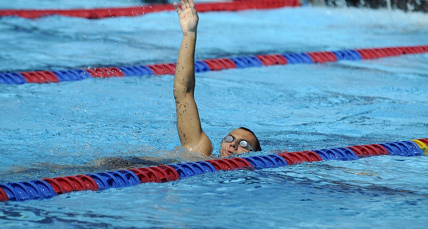 Pavel Ilyashenko warms up before the start of the 200-meter freestyle mixed relay June 8.