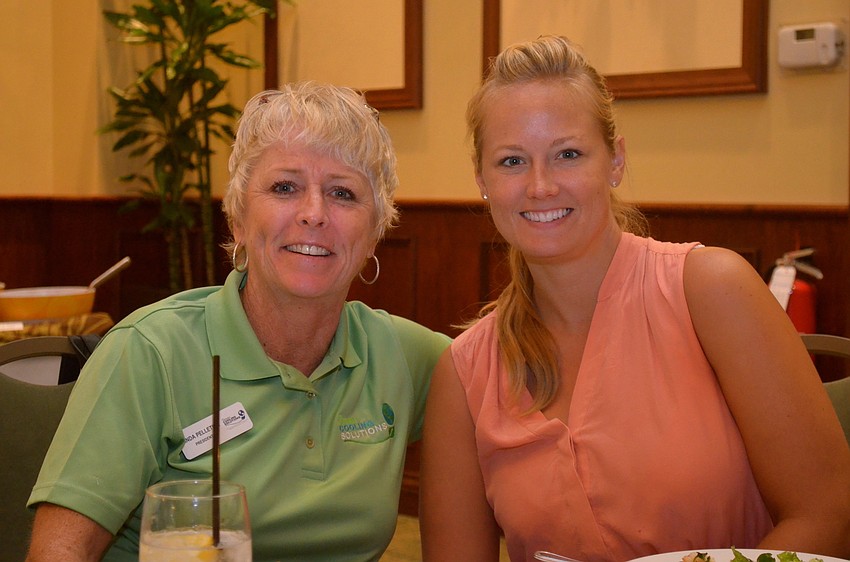 Linda Pelletier and Christi Newkirk make friends.