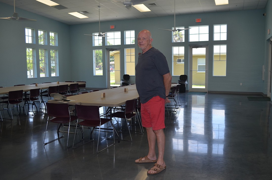 Paul Welch stands in First Step's newest addition, the Welch Family Foundation Community Room.