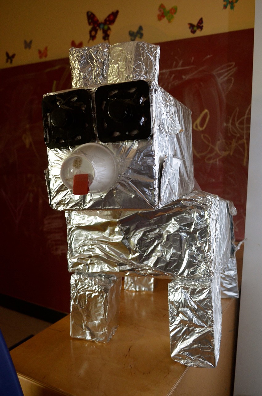 Students worked in groups to craft robots earlier in the week.