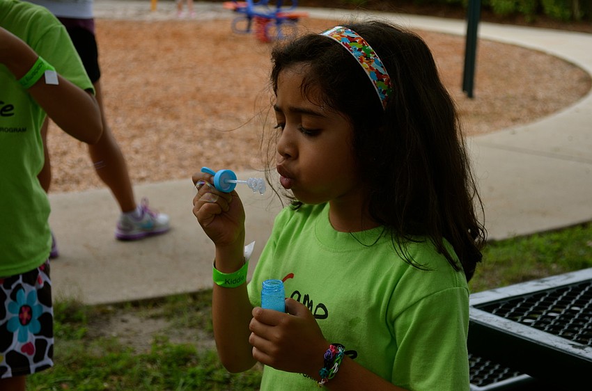 Namita Kondabala blows bubbles.