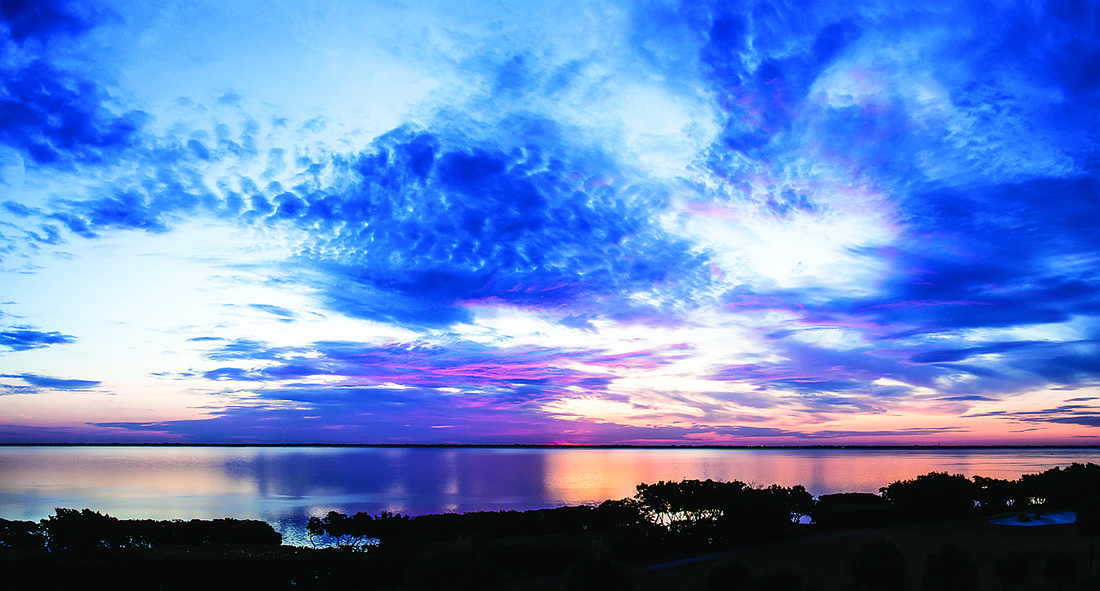 Longboat Key resident John Pan submitted this sunrise photo, taken overlooking Sarasota Bay.