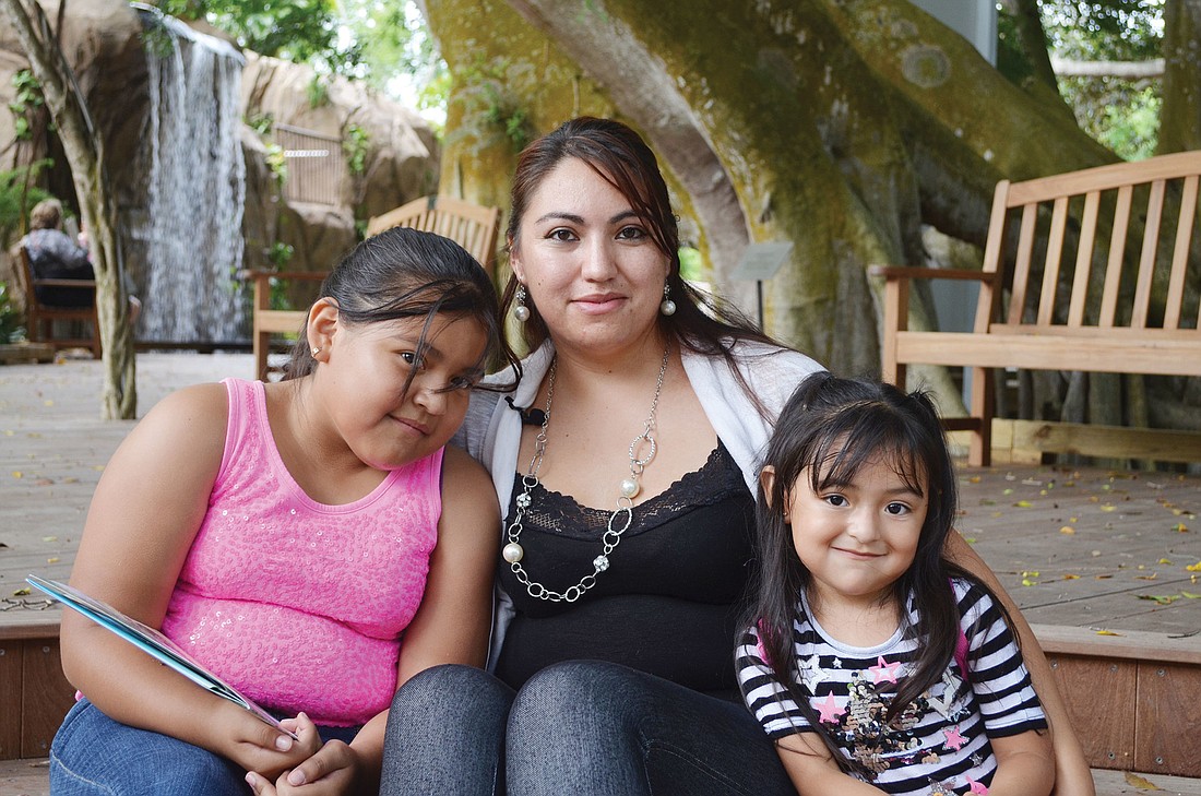 Ivonne Padilla and her daughters, Karina and Brithney, explored Selby Gardens for the first time Saturday, after receiving a free yearlong membership. Padilla looks forward to introducing her daughters to the beauty of nature.