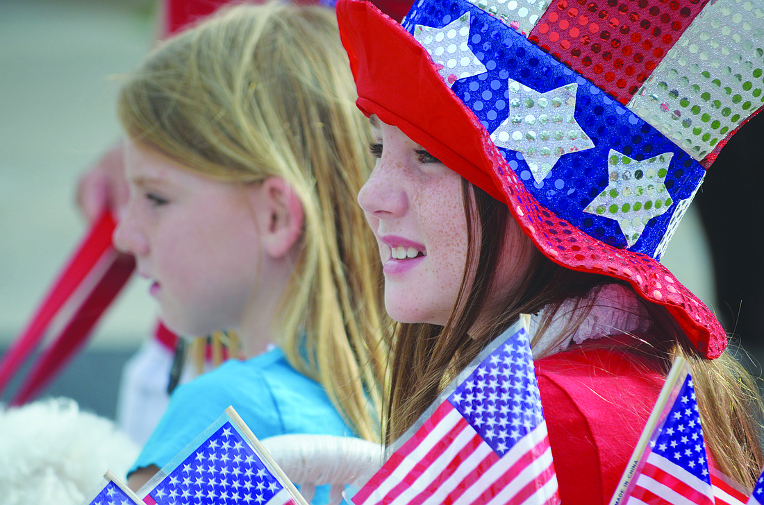 File photo Sara Green, 6, and her sister, Izzy, 8, celebrate in patriotic attire at last year's Freedom Fest.
