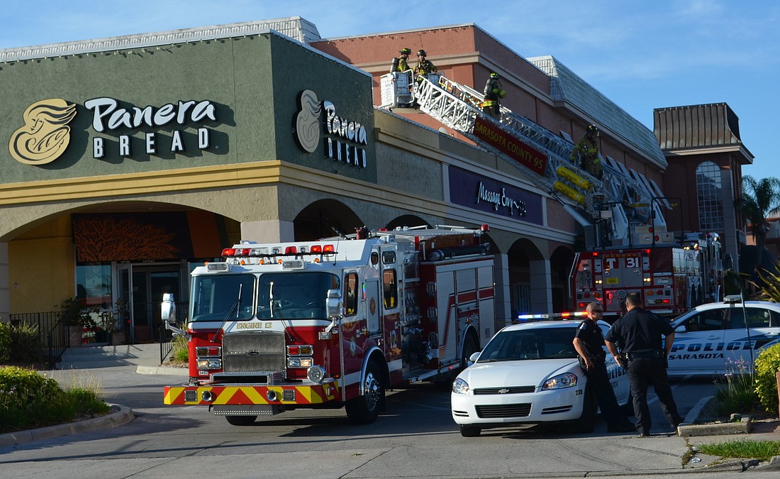 Sarasota County firefighters begin clearing the scene of an electrical malfunction at Panera Bread on South Tamiami Trail at 8:05 a.m. Wednesday.