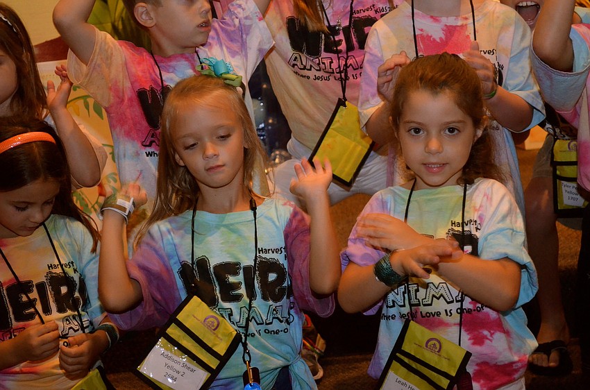 Addison Shear and Leah Hegemier dance to the music.