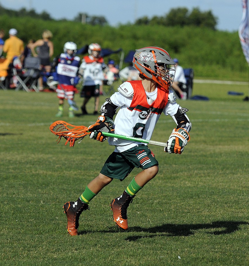 LB3 Monsters U11A forward Ryan Sforzo, 10, pushes his way toward the goal in the first half versus the LB3 Tarpons.