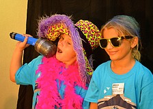 Emily Ayers and Rebecca Richardson pose for pictures.
