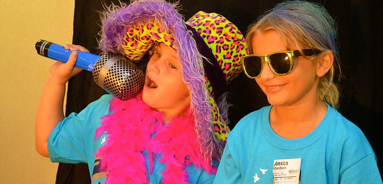 Emily Ayers and Rebecca Richardson pose for pictures.