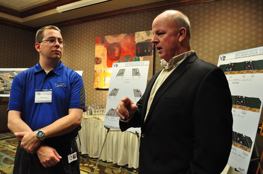 FDOT Project Engineer Kevin Ingle and FDOT District 1 Spokesperson Robin Stublen talk with attendees.
