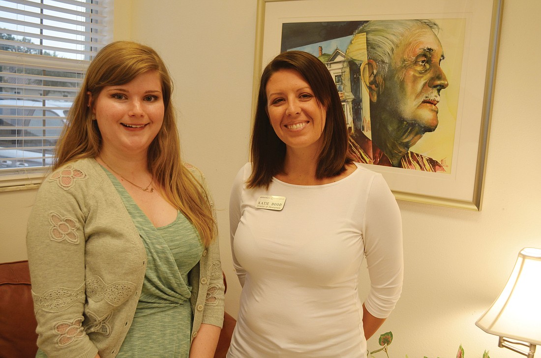 Volunteer Sierra Snow and Director of Development Katie Hood enjoy working one-on-one with people affected by Alzheimer's.
