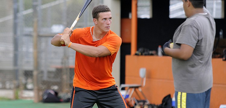 Sarasota High senior catcher Carson Keyser works on a hand-eye coordination drill during the Sailors baseball camp July 7.