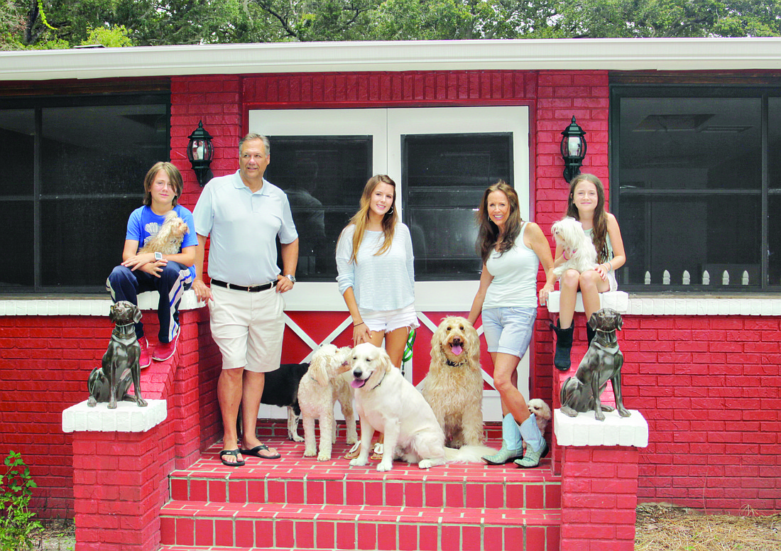 Courtesy photo Connor Perry, Mark Engeberg, Emily Cameron, owner Heather Perry and Cameron Perry, all founding members of the Canine Ranch Country Club, are eager to open the facility in the fall.