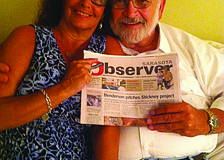 DINNER DUO. Linda Pearson and Phil Pickrell brought their Sarasota Observer along to a dinner at Pearson's sister's house in Sarasota.