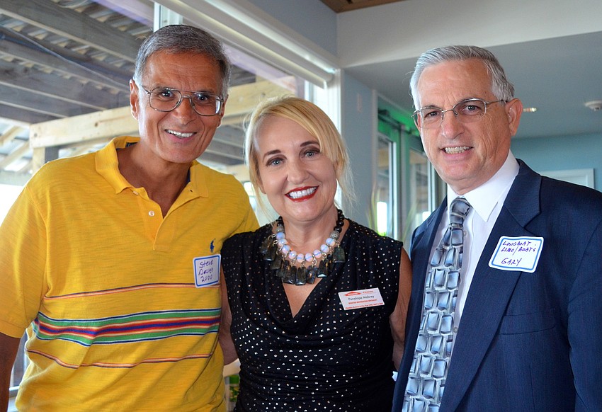 Steve Gianopolus, Design 2000, Penelope Mabrey, ServPro of Bradenton, and Gary Humphreys, Longboat Limo