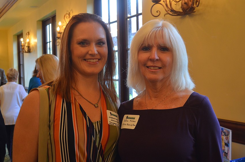 Heather Hackett, of Sarasota Music Half Marathon, and Debra Fortosis, of Elite Family care.