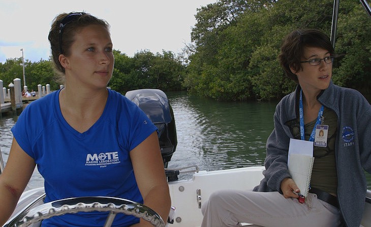 Mote Marine Laboratory staff biologist Rebeccah Hazelkorn and public relations coordinator Hayley Rutger navigate the Stranding Investigation ProgramÃ¢â‚¬â„¢s new 13-foot Boston Whaler out the canals of City Island.