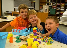 Grayson Meyer, Caleb Hebert and Landon Stewart make crafts.