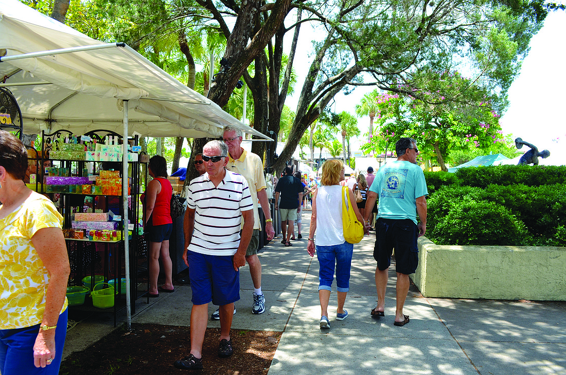File photo St. Armands Circle organizations have been pushing for a restriction on special events at St. Armands Circle Park, citing concerns about traffic congestion and a decrease in business activity during the height of tourist season.