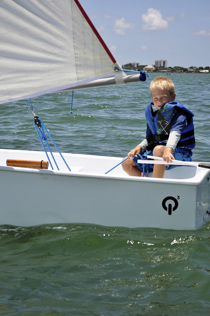 Sarasota Youth Sailing Programâ€™s summer sailing camp students sail optiâ€™s through Sarasota Bay.