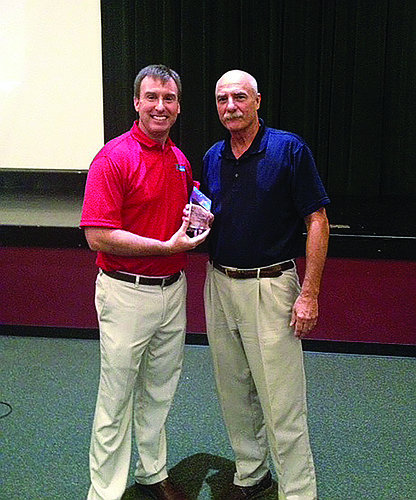 Courtesy photo Sarasota resident Bill Siedlecki, right, was presented with the FHSAA football official of the year award for the first time during the FHSAA Leadership Conference last month.