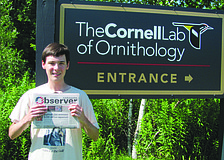 PRESSING EVENT. Matthew Press catches up on his Sarasota Observer news while attending the Young Birders Event at the Cornell Lab of Ornithology in Ithaca, N.Y.