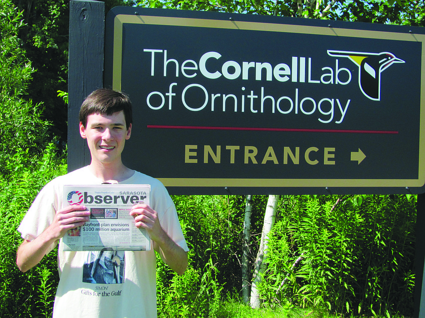 PRESSING EVENT. Matthew Press catches up on his Sarasota Observer news while attending the Young Birders Event at the Cornell Lab of Ornithology in Ithaca, N.Y.