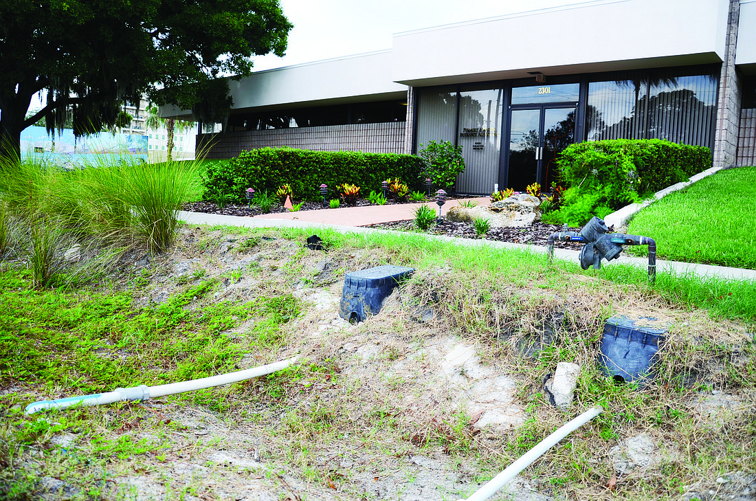 Photo by Jessica Salmond One bioswale, located in front of Purmort & Martin Insurance Agency, uncovered owner Jamie PurmortÃ¢â‚¬â„¢s irrigation system and ruined the landscaping in front of his business.