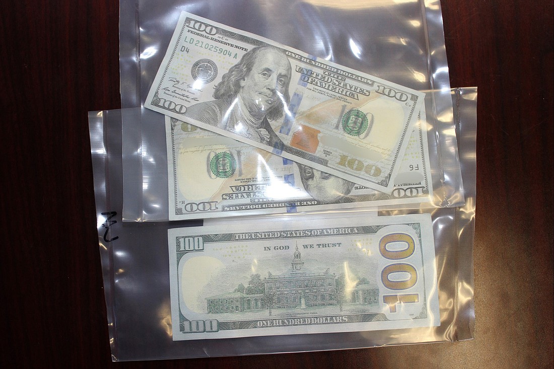 The men attempted to use counterfeit $100 bills at three different 7-Eleven locations.