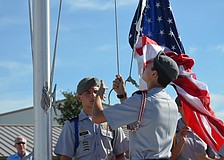 Cadets raise the flag.