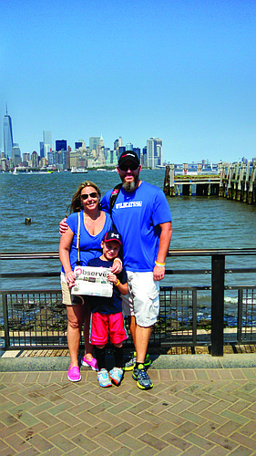 NEW YORK STATE OF MIND. Amy, Jackson and Charles Riffe catch up on their hometown news while enjoying the view of New York City from the grounds of the Statue of Liberty.