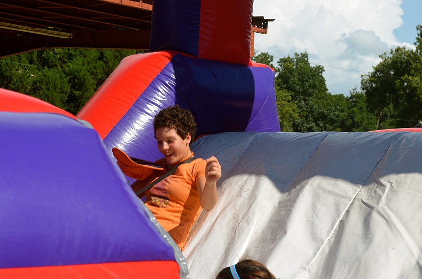 Gabby Jarosz whips down the slide.