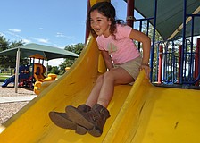 Macayla Yannucciello, 8, goes down the slide.