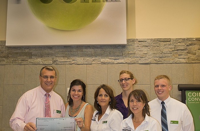 Publix Manager Andy Lappin and Selah Freedom President Elizabeth Fisher with Publix employees Michele Toussaint, Denise Rowland, Gina Fabrizio and Trevor Moore. Courtesy photo